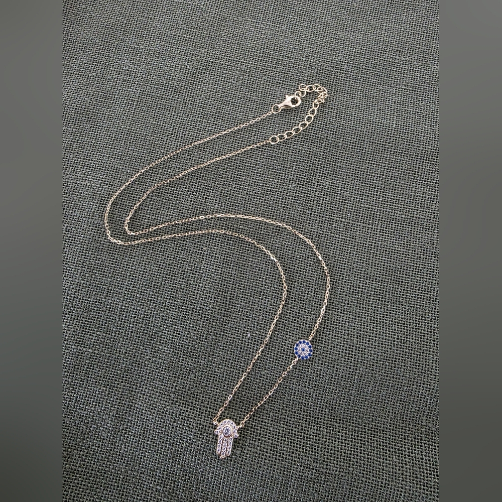 Gold Tone Hamsa Hand + Blue Evil Eye Necklace (CZ Pavé)